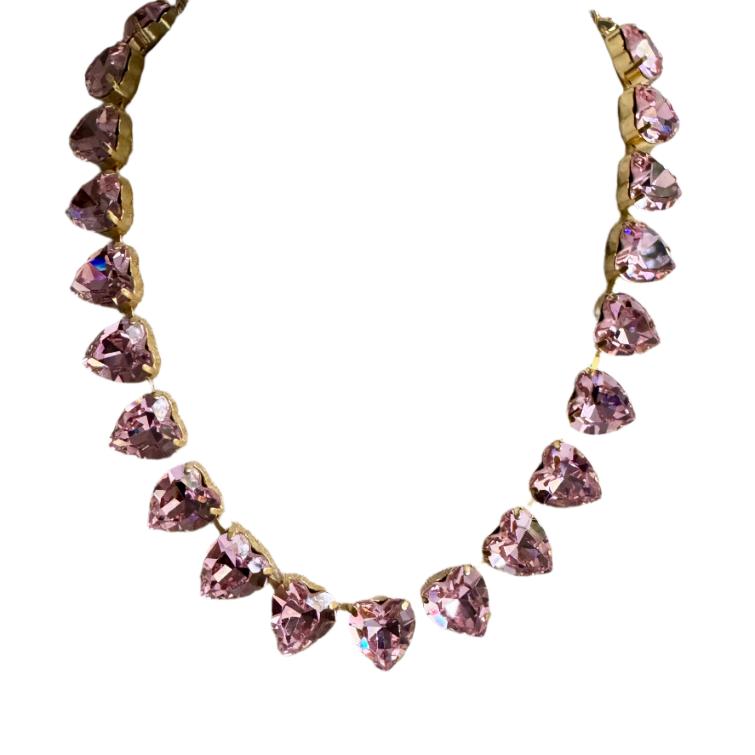 Necklace with pink heart-shaped crystals on a mannequin bust.