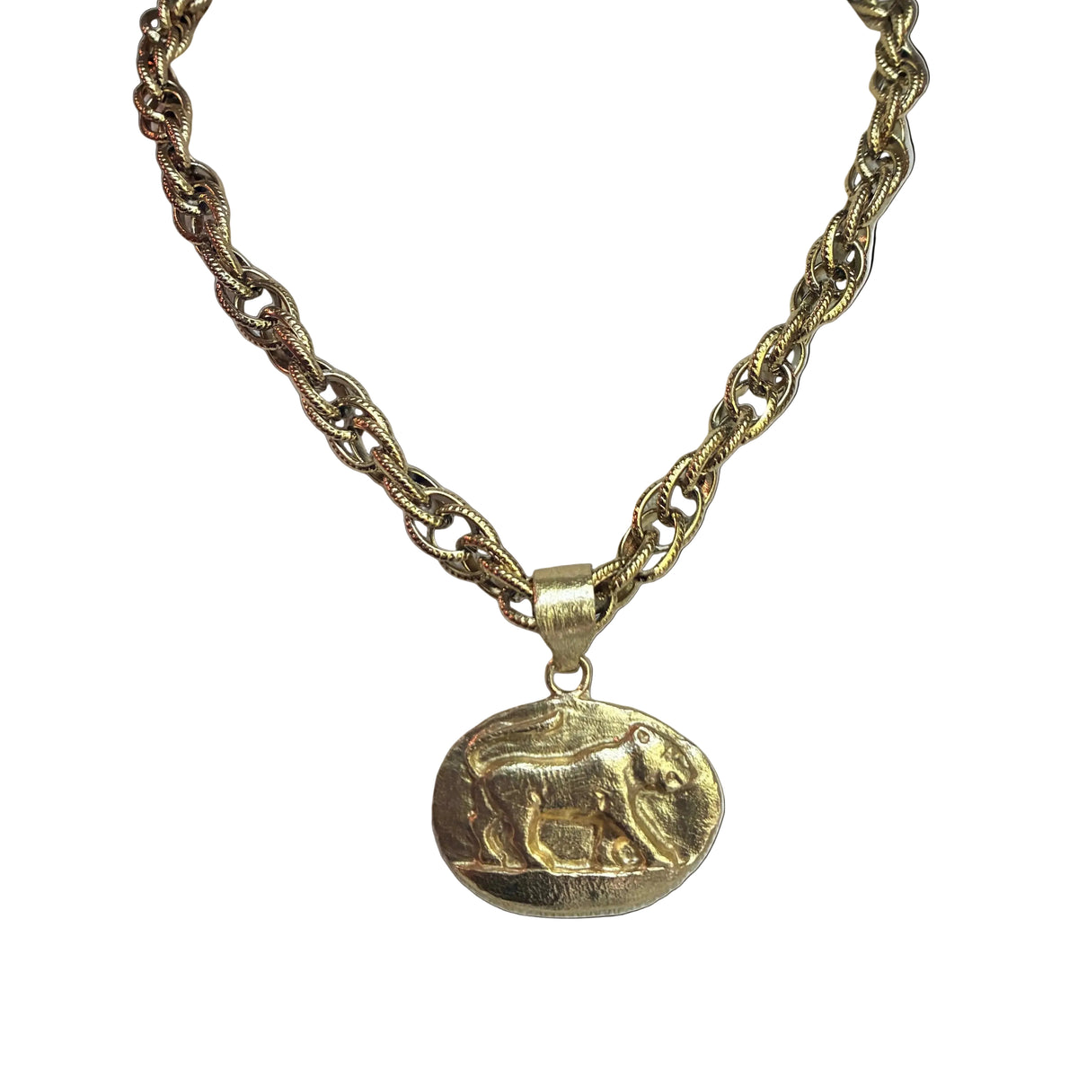 Gold chain necklace with a lion pendant on a white background