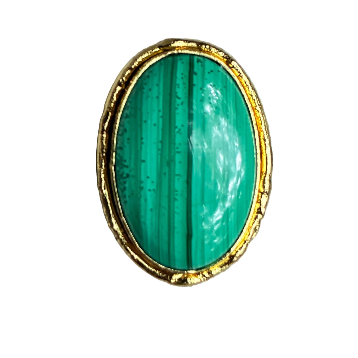 An oval-shaped gold ring featuring a vibrant green malachite stone with natural vertical banding, displayed on a textured light beige fabric ring stand.