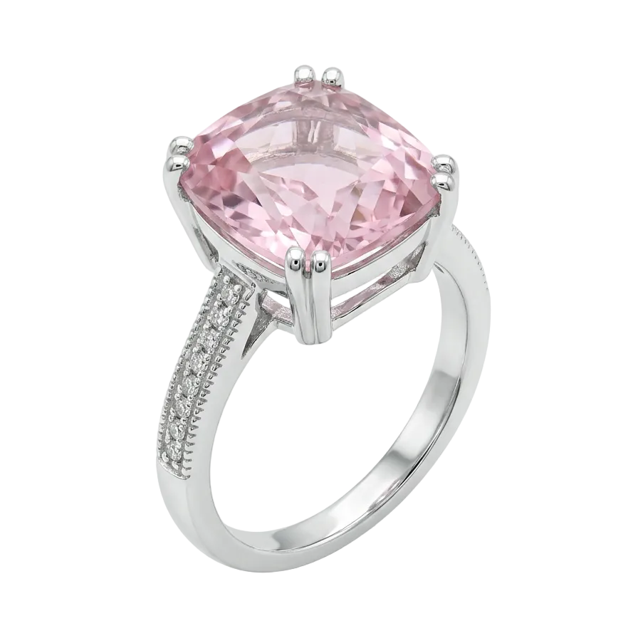 A cushion-cut pink gemstone ring in a silver-toned setting with a diamond-accented band, shown on a clean white background.