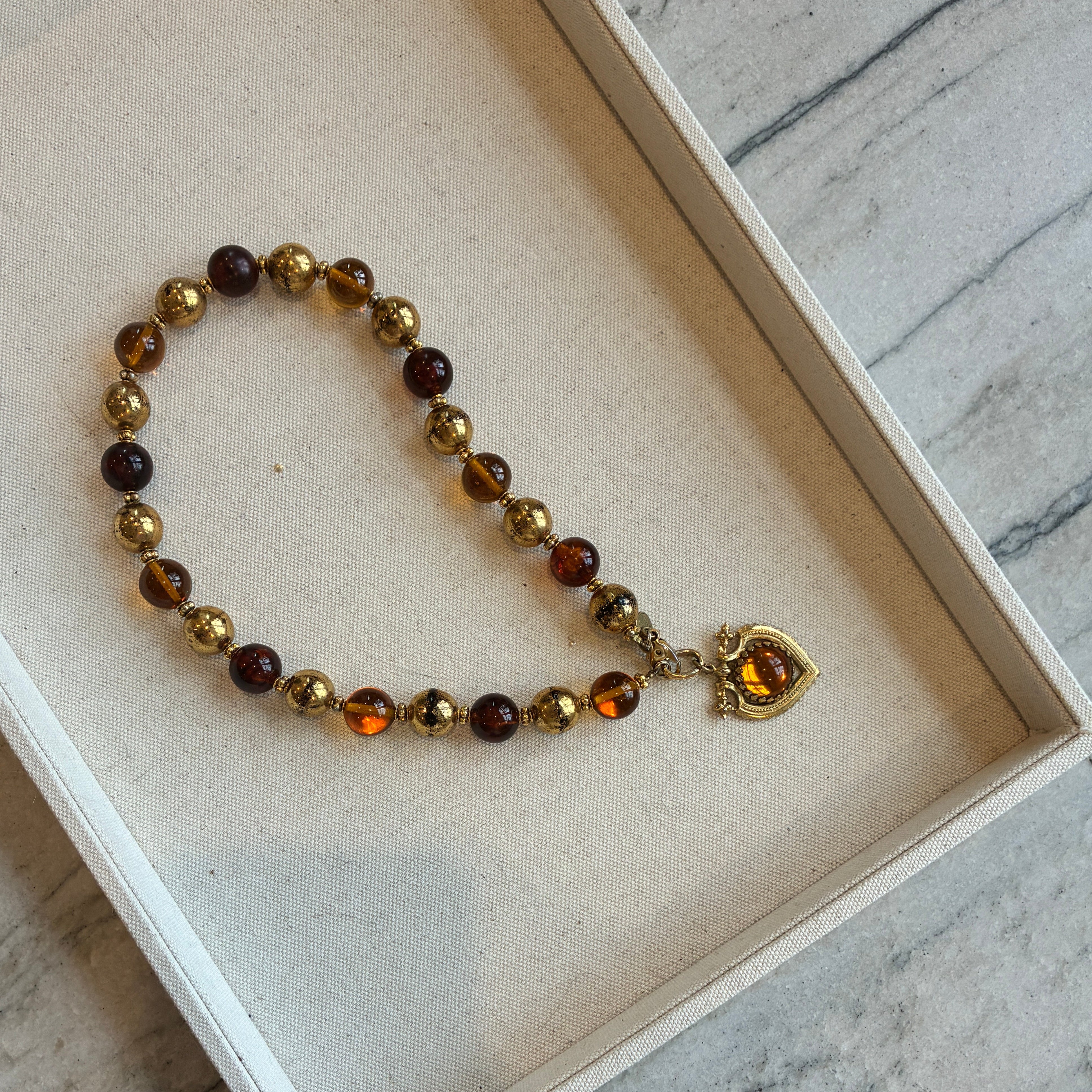 1970s French Brown & Gold Glass Charm Necklace