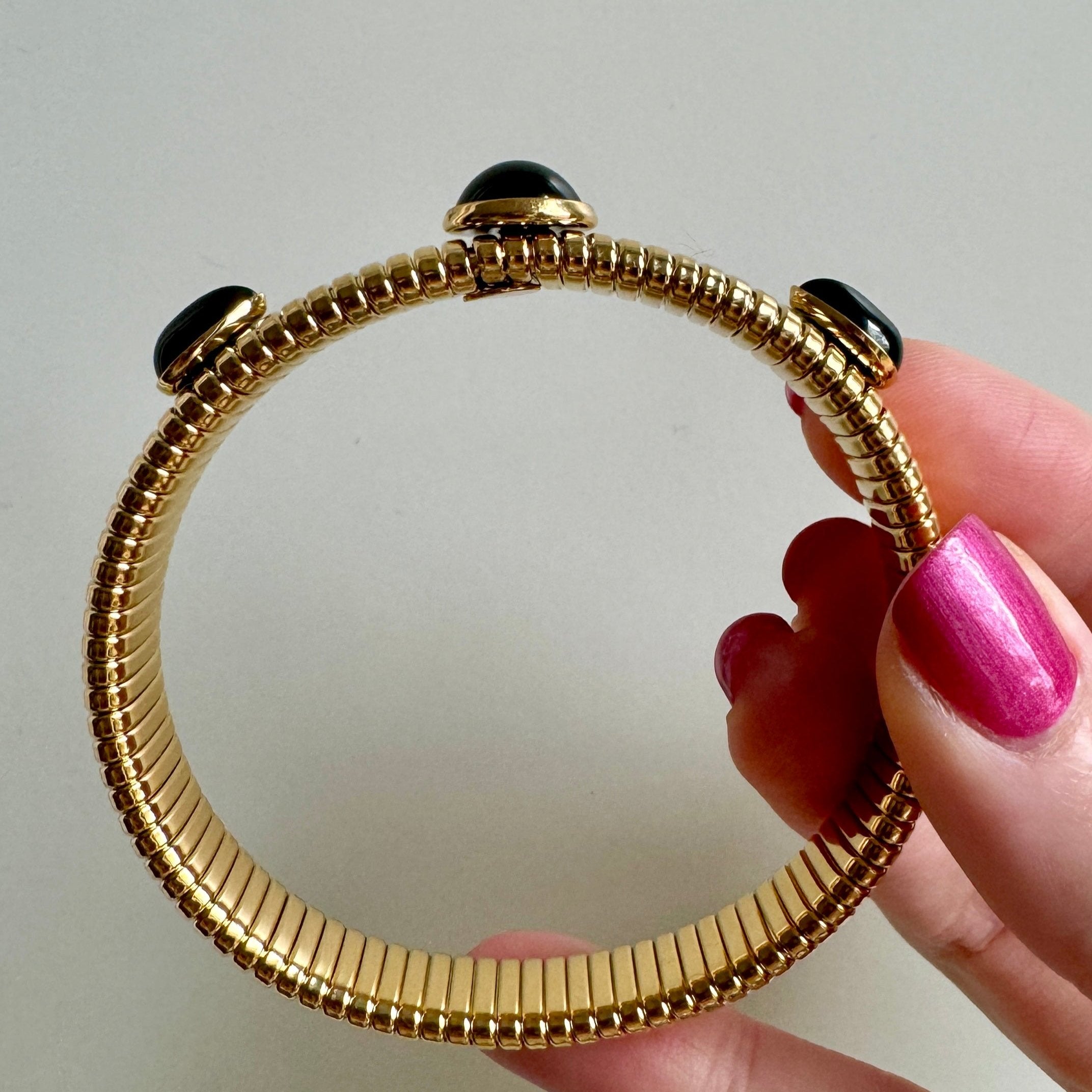 Gold Cobra Bracelet with Black Stones