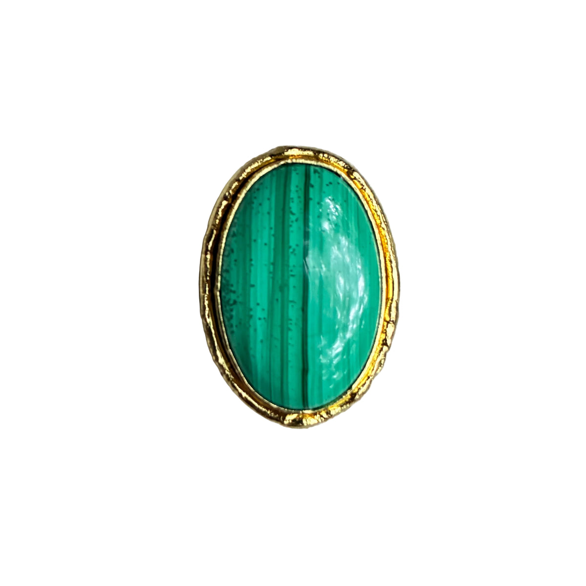 An oval-shaped gold ring featuring a vibrant green malachite stone with natural vertical banding, displayed on a textured light beige fabric ring stand.
