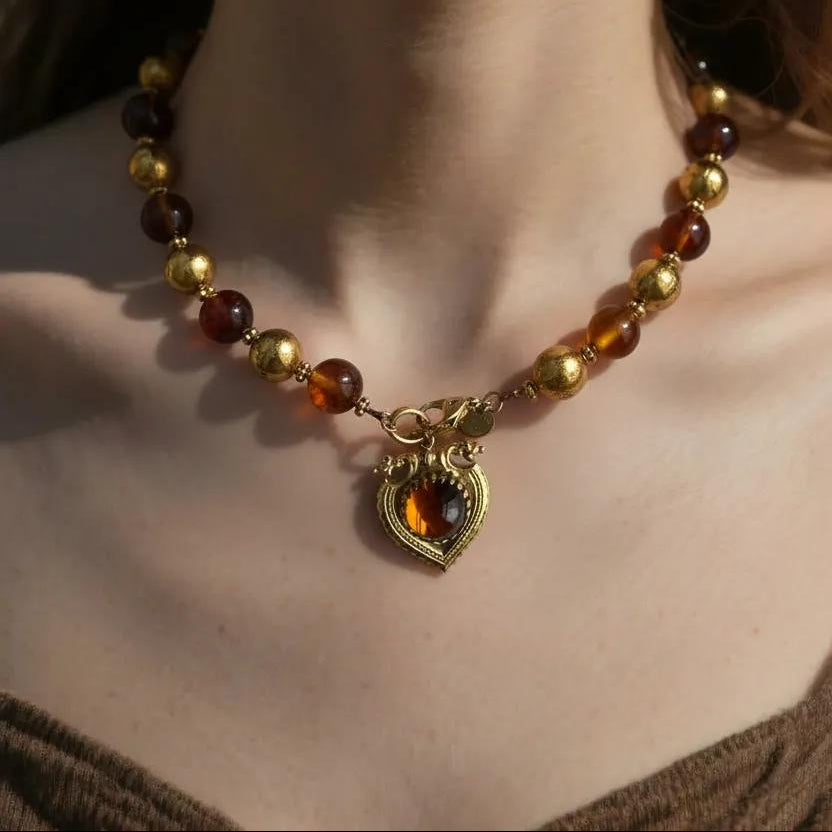1970s French Brown & Gold Glass Charm Necklace